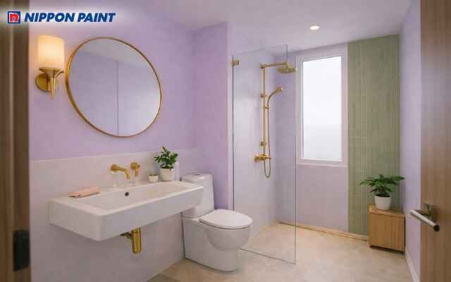 Thiết kế phòng tắm với màu tím chủ đạo giúp tăng sự hòa hợp và mang lại cảm giác an tâm cho gia chủ Mậu Tý 2008